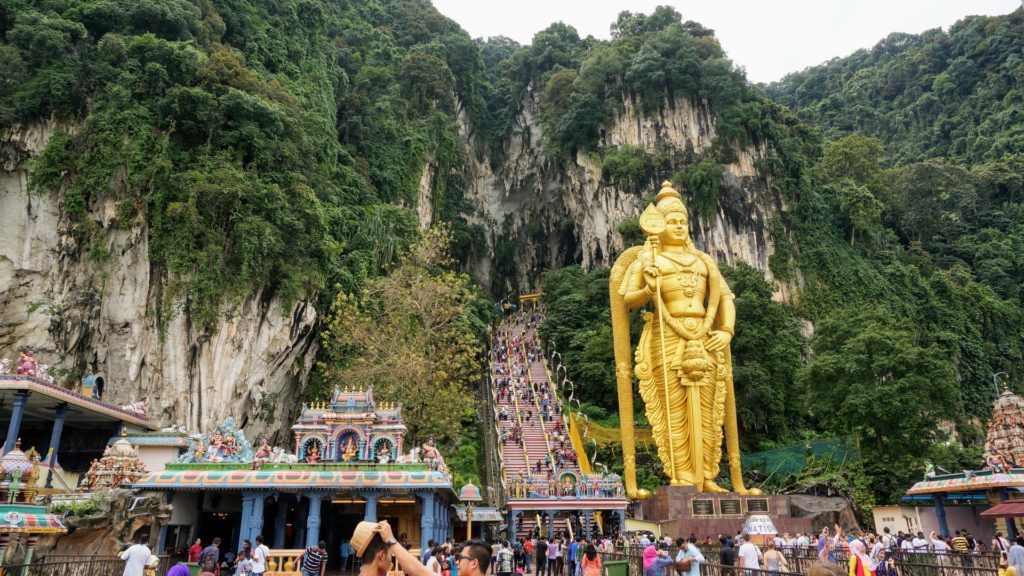 Places to include in your Malaysia itinerary Number 13 - Iconic Lord Murugan statue at Batu Caves.