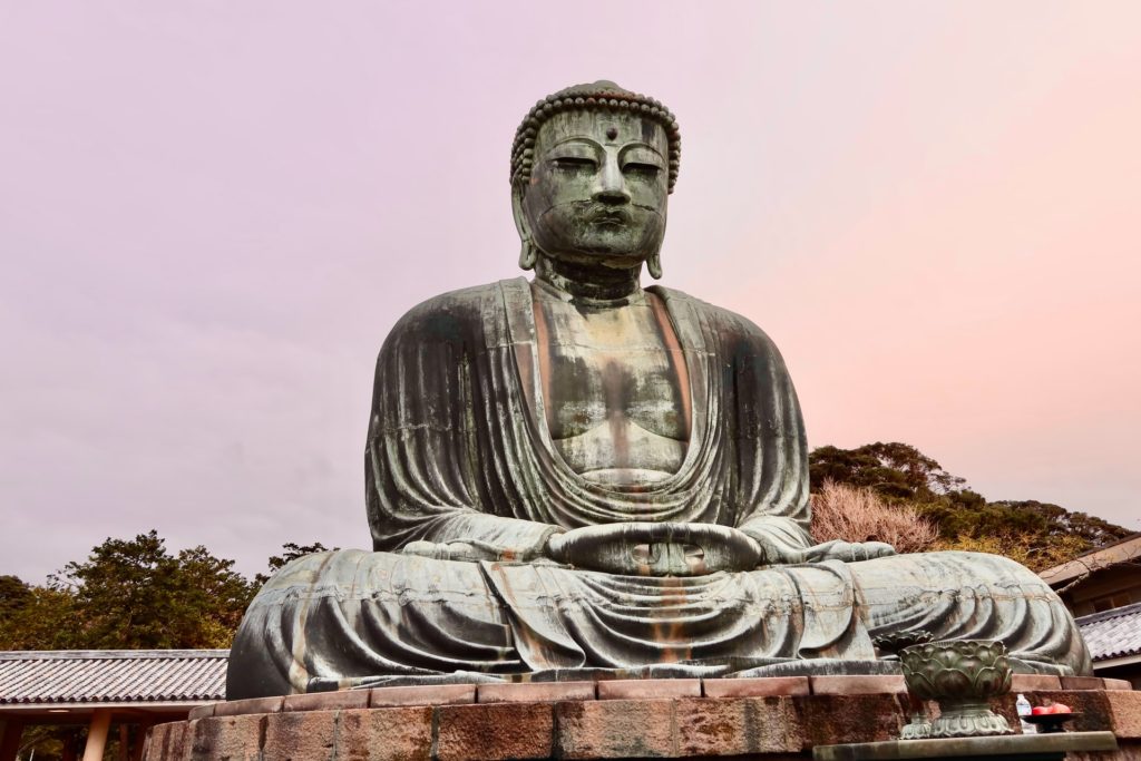 Places to include in your Japan itinerary Number 12 -  Buddha Statue at Kotoku-in Temple.